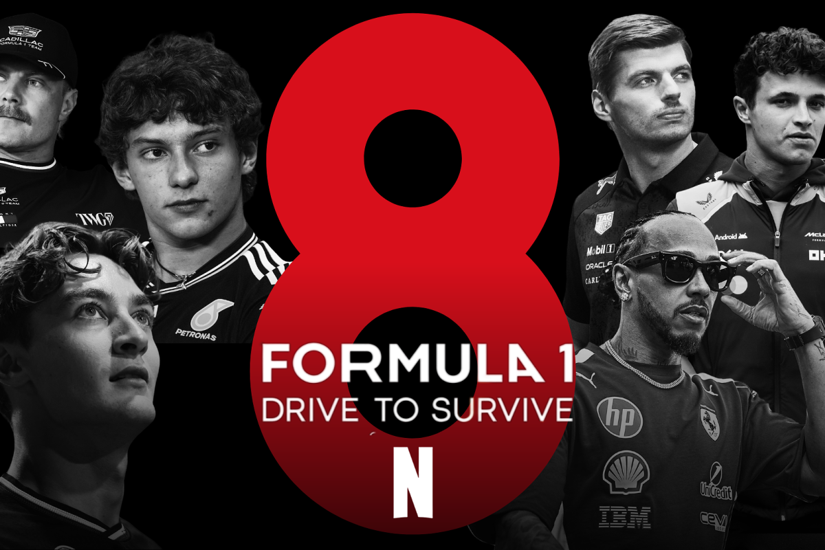 F1 drivers surround a sign showing the eighth season of Drive to Survive