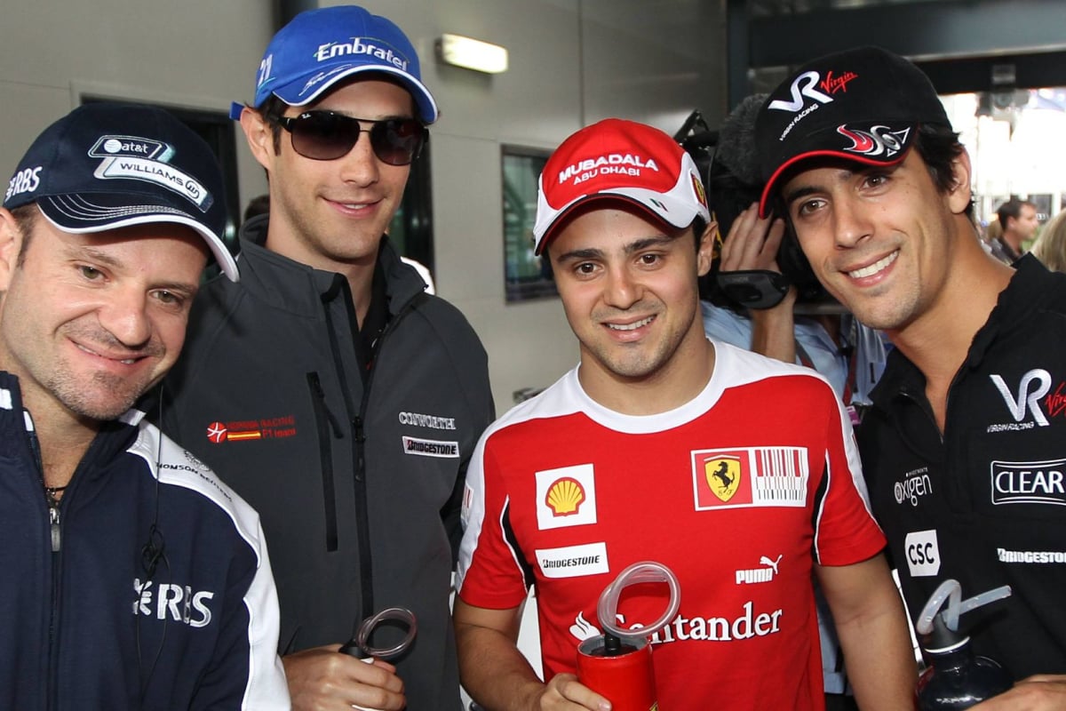 An image of Brazilian F1 drivers Rubens Barrichello, Bruno Senna, Felipe Massa, Lucas di Grassi posing for a photo during the 2010 season