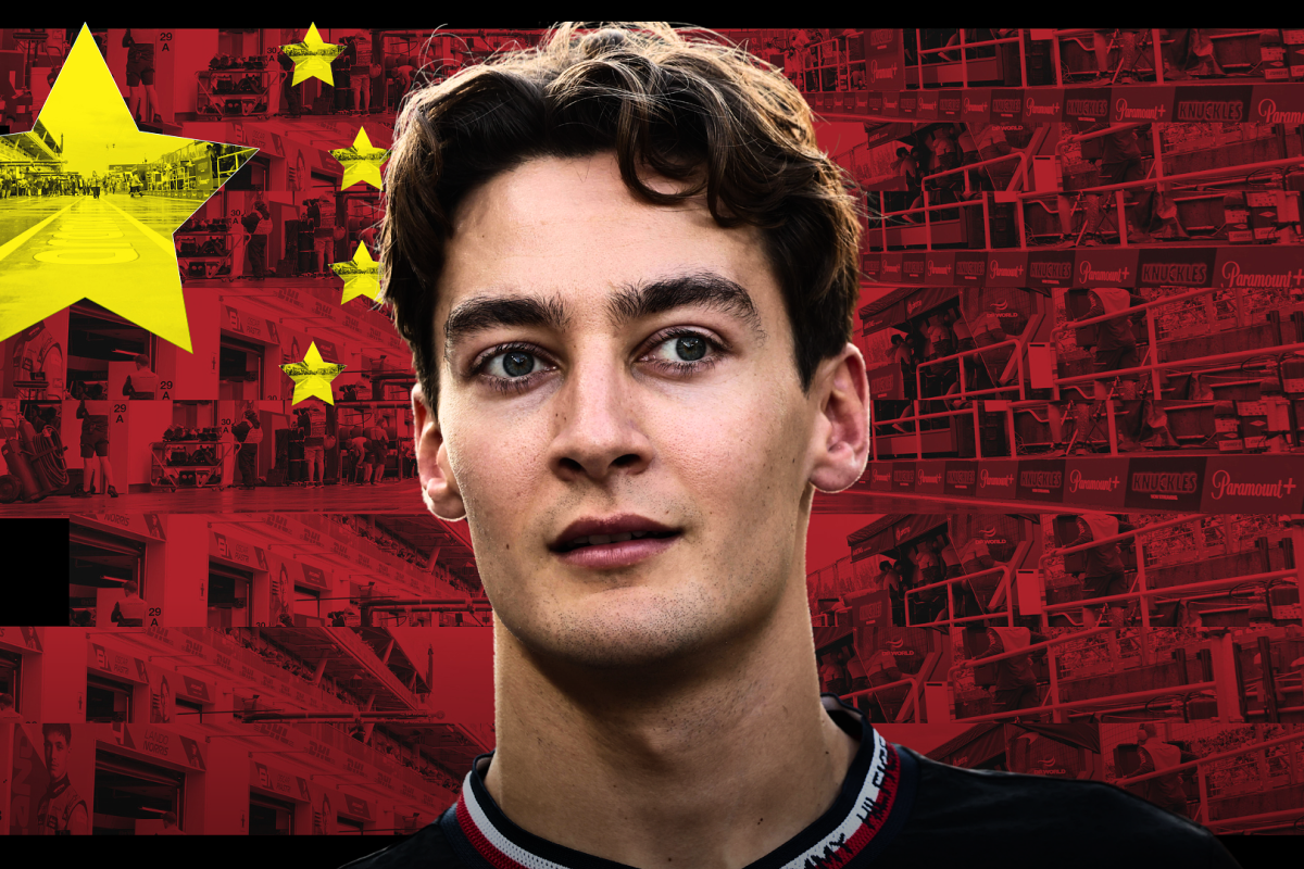 George Russell is pictured in front of a Chinese flag