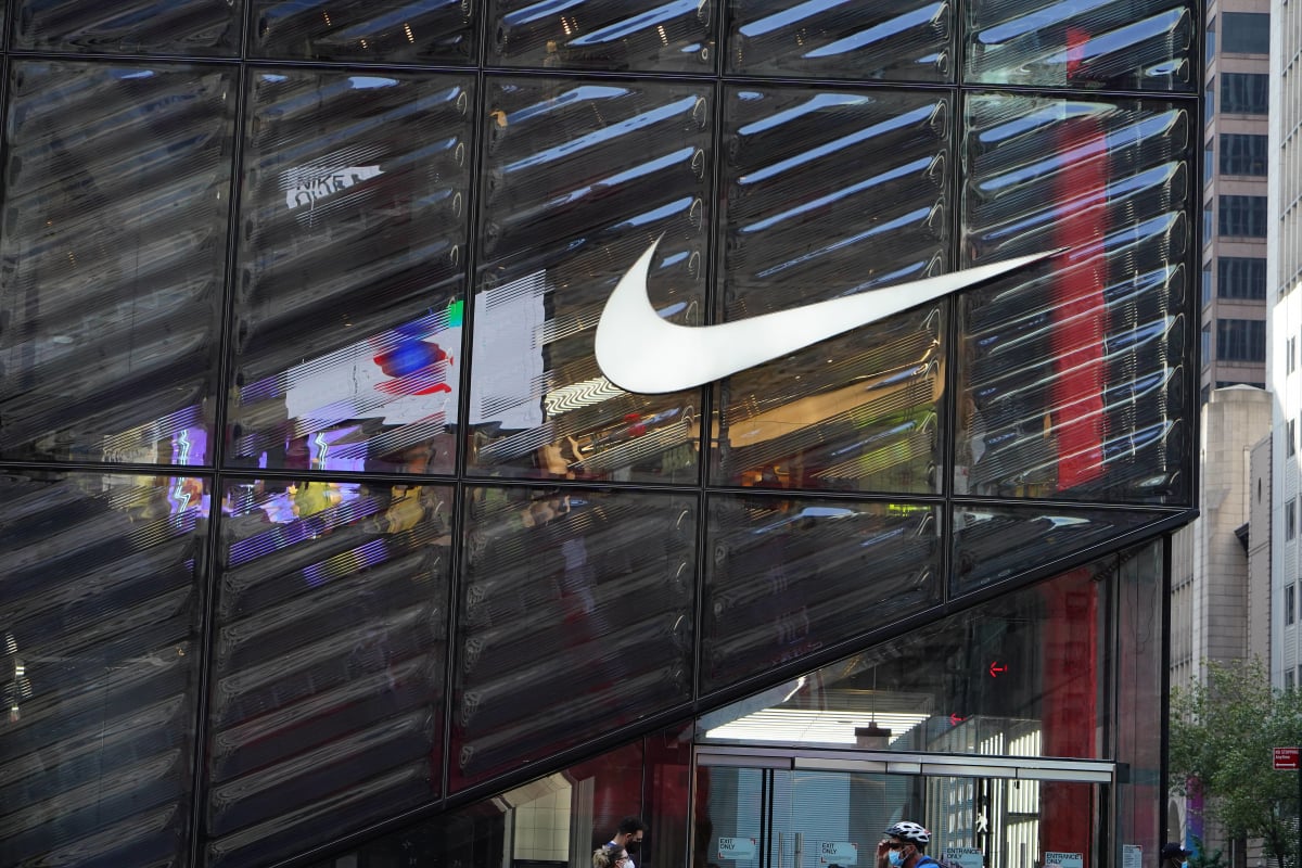 The Nike logo is shown on a US store
