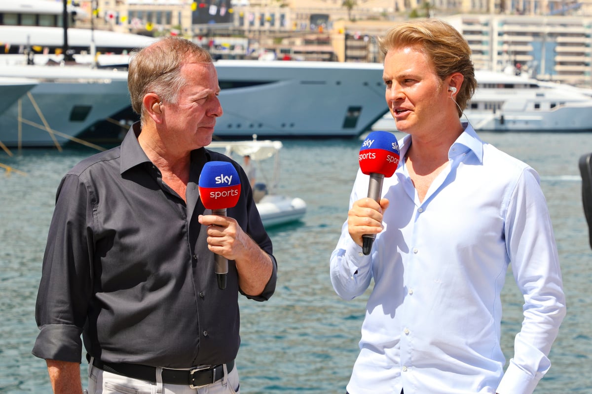 Martin Brundle and Nico Rosberg at the Monaco GP talking into Sky mics by the harbour