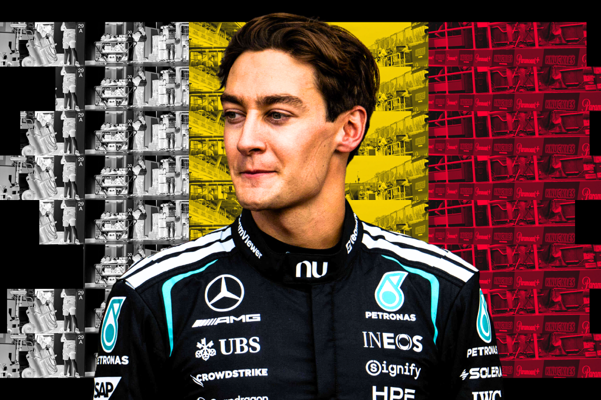 George Russell looks sad in front of the Belgian flag