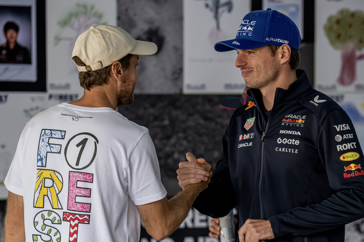 Sebastian Vettel and Max Verstappen talk at the Brazilian Grand Prix