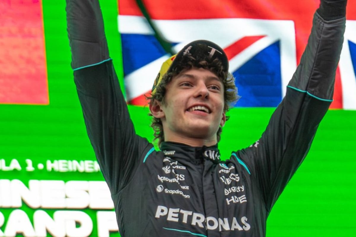 Kimi Antonelli stands on the podium for Mercedes after winning the 2026 Chinese Grand Prix