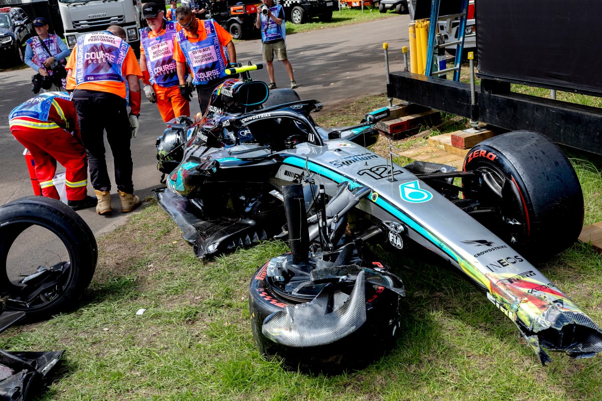 Kimi Antonelli's Mercedes lies on the Melbourne grass smashed to pieces after his crash in FP3
