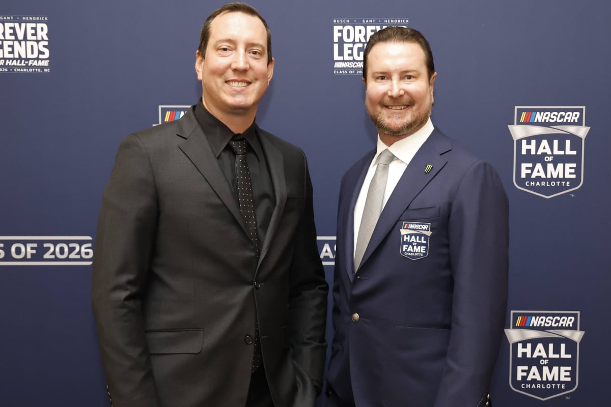 An image of NASCAR stars and brothers Kurt Busch and Kyle Busch at the 2026 Hall of Fame ceremony