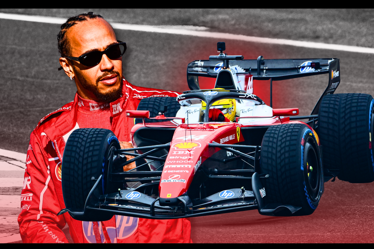 Lewis Hamilton is pictured next to the new Ferrari car for 2026