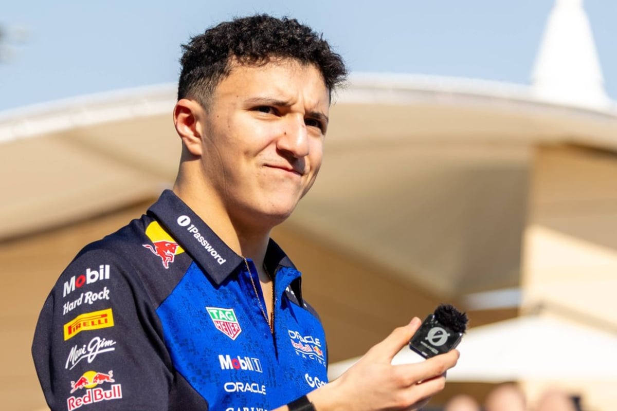 Isack Hadjar looks on from the Bahrain paddock