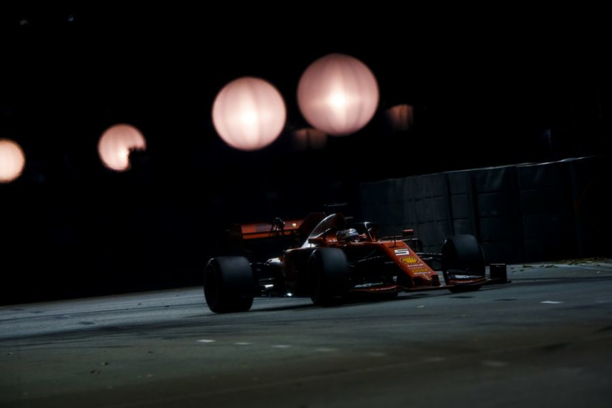 Vettel jumps Leclerc with Ferrari's help to win in Singapore