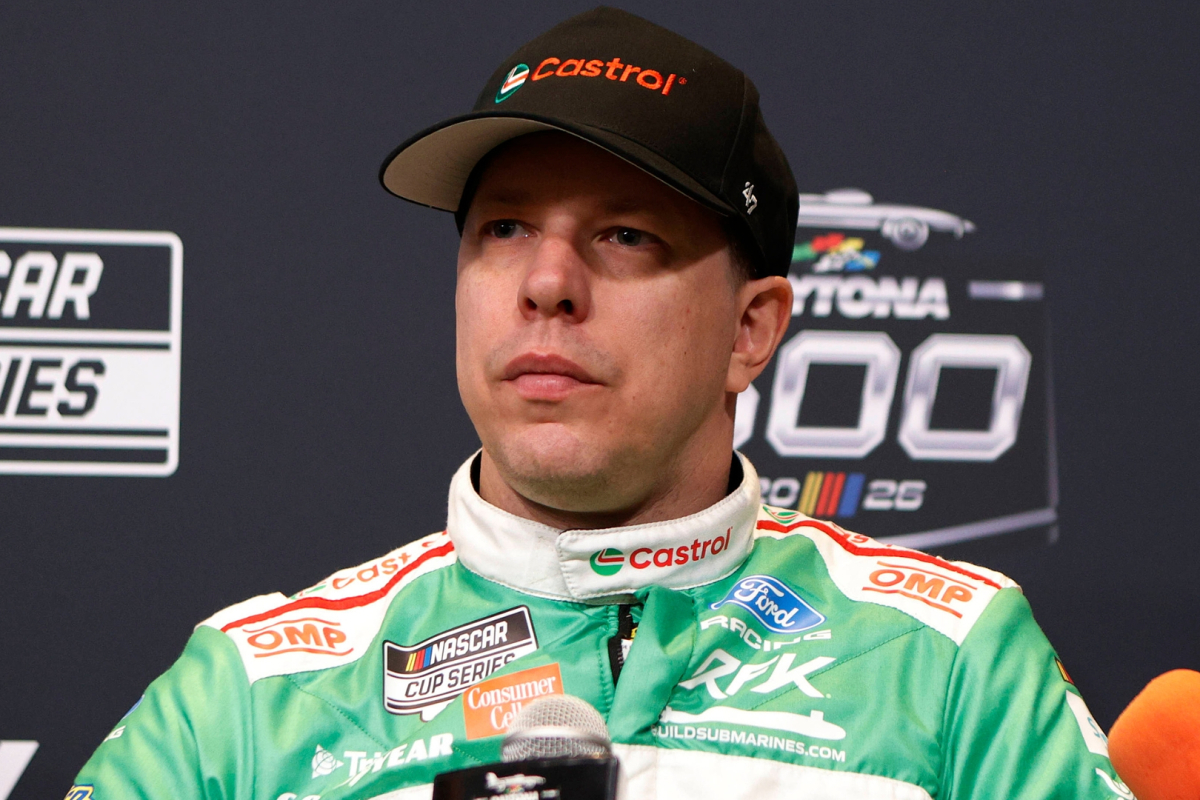 An image of NASCAR driver Brad Keselowski speaking to the media