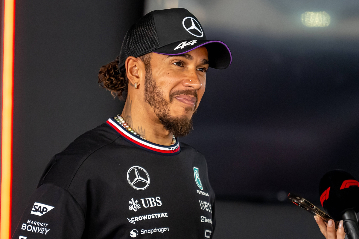 Hamilton all smiles as Mercedes show off NEW car