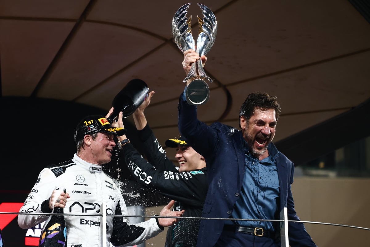 Javier Bardem and Brad Pitt celebrate on the F1 podium