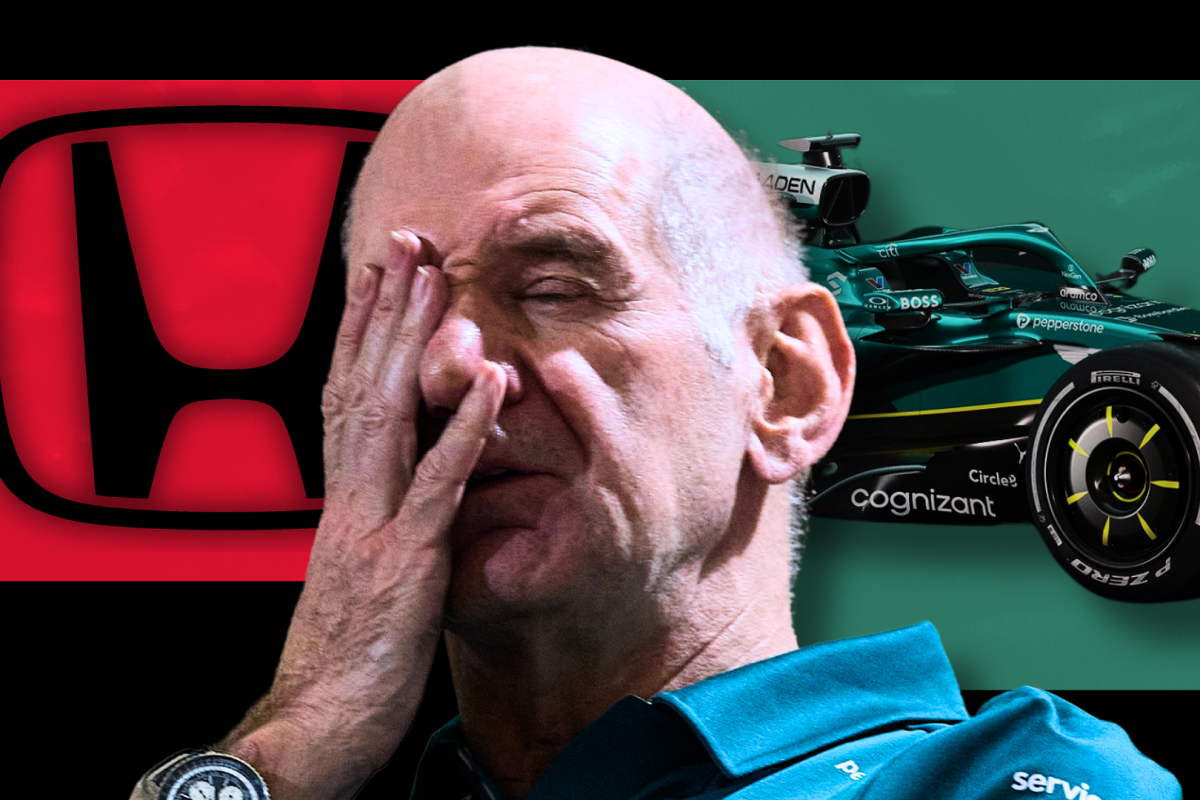 Newey with his head in his hand with a black background, red Honda logo to his left and green Aston Martin F1 car to his right