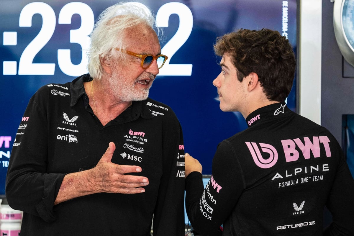 Briatore and Colapinto in deep conversation in the Alpine garage