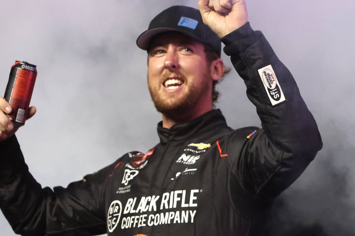 An image of NASCAR driver and YouTube star Cleetus McFarland smiling