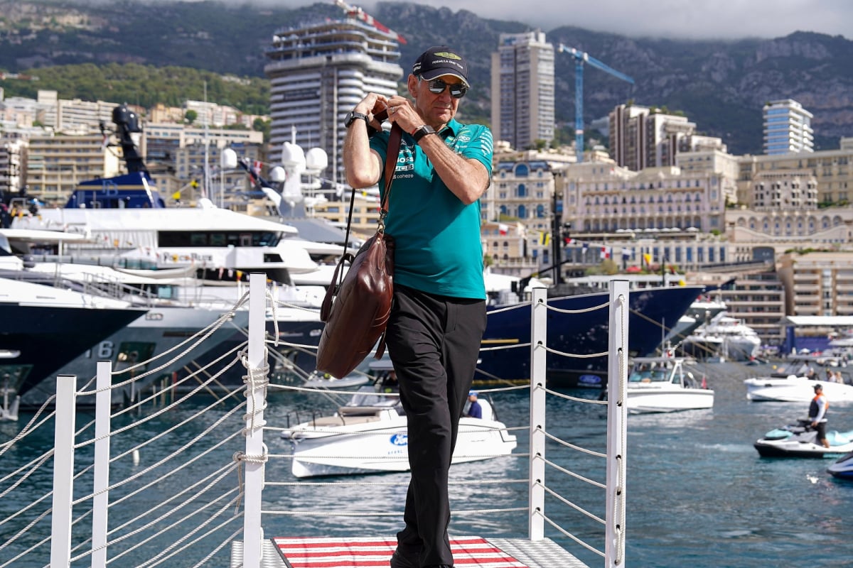 Adrian Newey stepping off a yacht flanked by the Monaco backdrop looking slay
