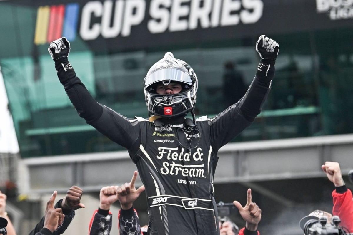 An image of 23XI NASCAR star Corey Heim celebrating his 2026 Brickyard 400 victory