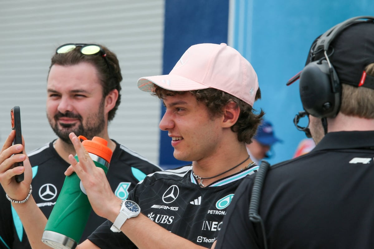 Antonelli struggling to see his iPhone in Mercedes t-shirt at Miami Grand Prix