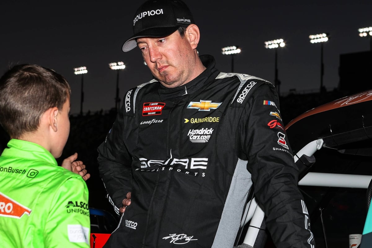 An image of NASCAR legend Kyle Busch alongside son Brexton at a racing event