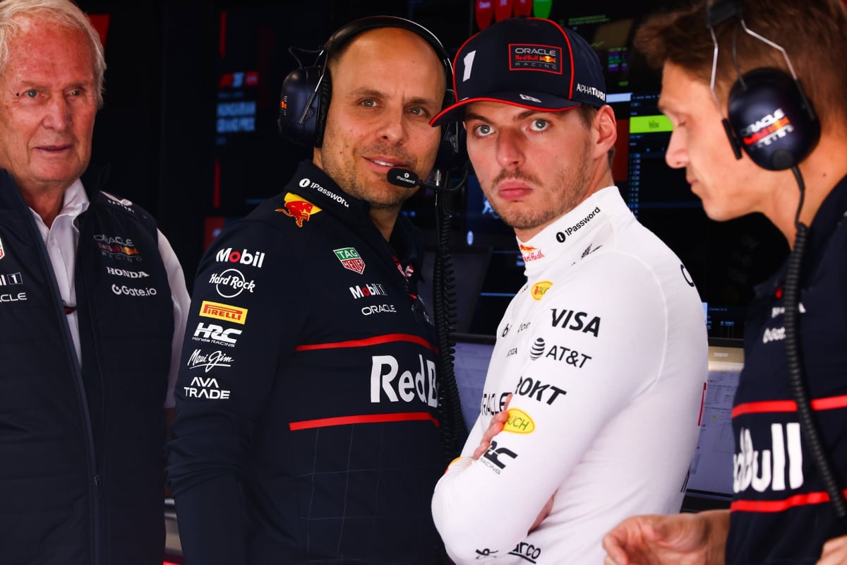 Marko, Lambiase and Verstappen stood in Red Bull F1 garage