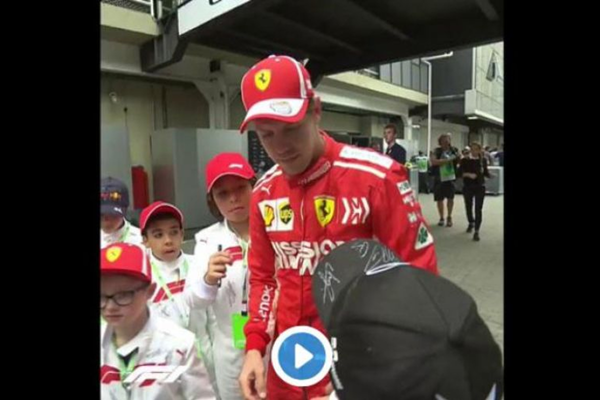 VIDEO: Vettel not a fan of grid kid's Mercedes cap