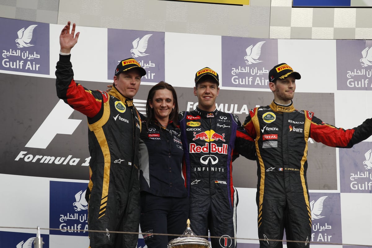 Kimi Raikkonen, Sebastian Vettel, Romain Grosjean stand on the 2013 Bahrain Grand Prix podium
