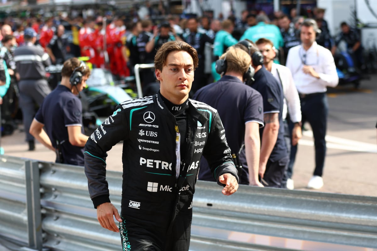 George Russell looks downcast at the Monaco GP