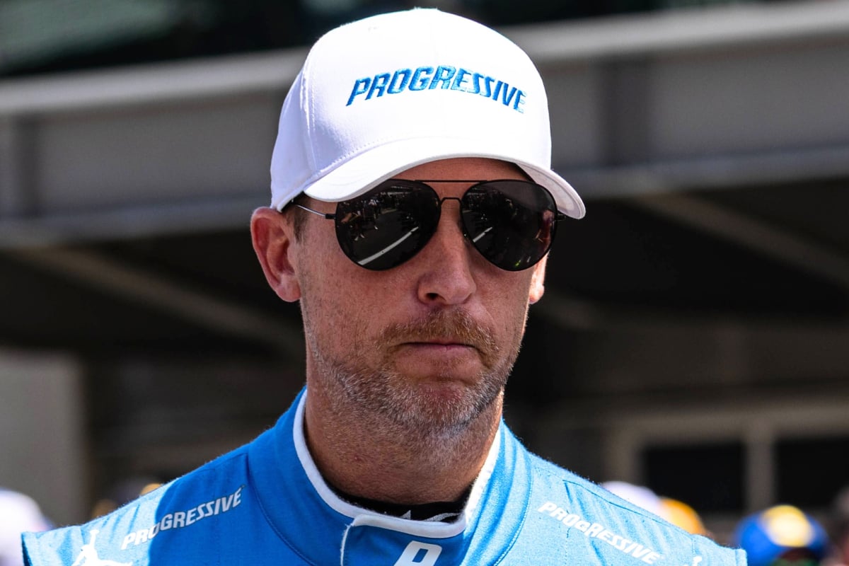An image of NASCAR Cup Series star Denny Hamlin looking unhappy