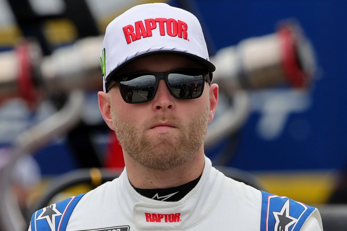 An image of Hendrick Motorsports NASCAR driver William Byron looking unhappy on pit road