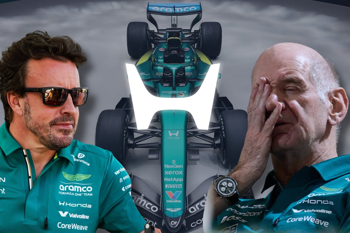 Fernando Alonso and Adrian Newey look towards a Honda logo with an Aston Martin car in the background