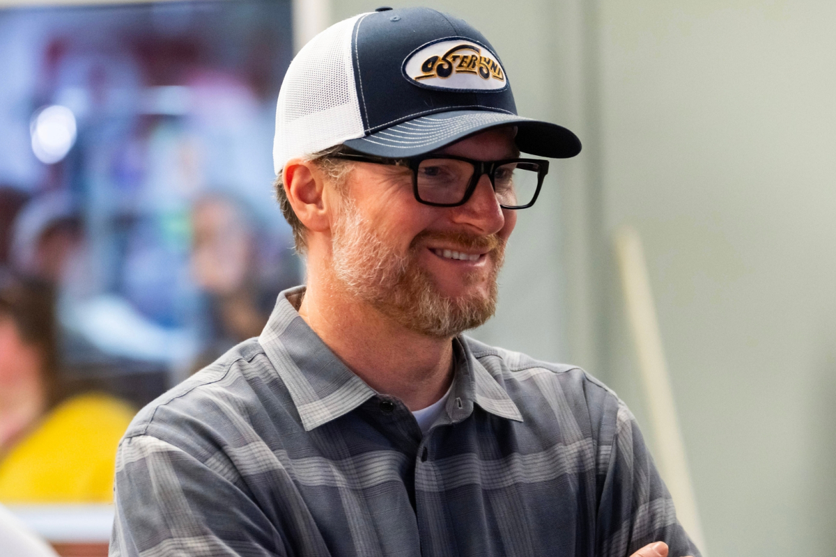 An image of NASCAR legend and JR Motorsports owner Dale Earnhardt Jr smiling
