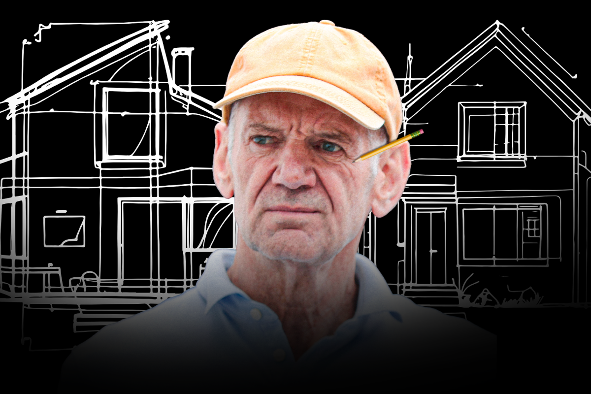 Adrian Newey with a drawing of architectural plans in the background 