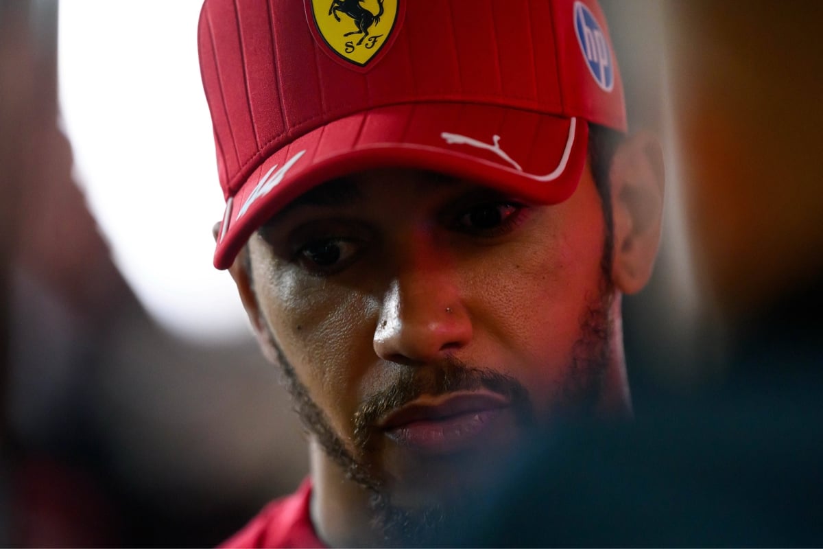 Lewis Hamilton looking downcast at the Qatar Grand Prix
