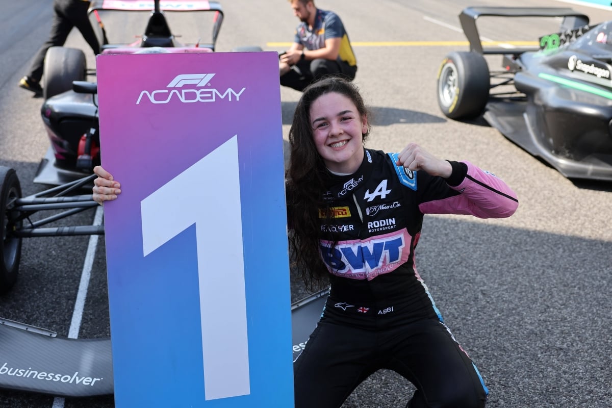 Abbi Pulling celebrating her 2024 F1 Academy title at the Abu Dhabi Grand Prix