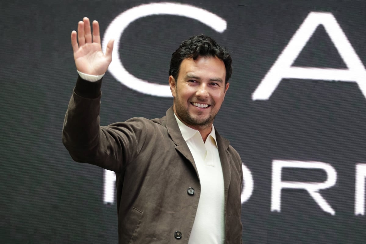 Sergio Perez waving to the crowd at the Cadillac launch in Mexico City