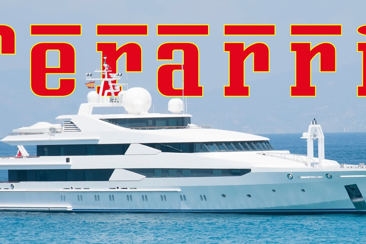 A yacht with the word ferrari above it