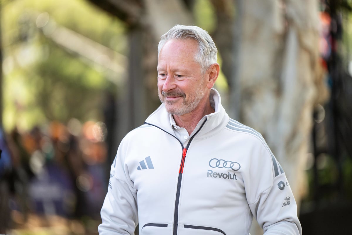 Audi F1 chief Jonathan Wheatley smiles in the paddock at Melbourne