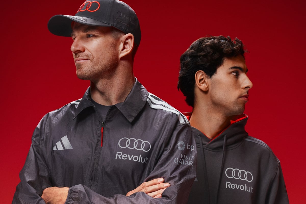 Credit: Audi. Hulkenberg and Bortoleto head to toe in Audi adidas F1 kit looking serious and facing separate ways