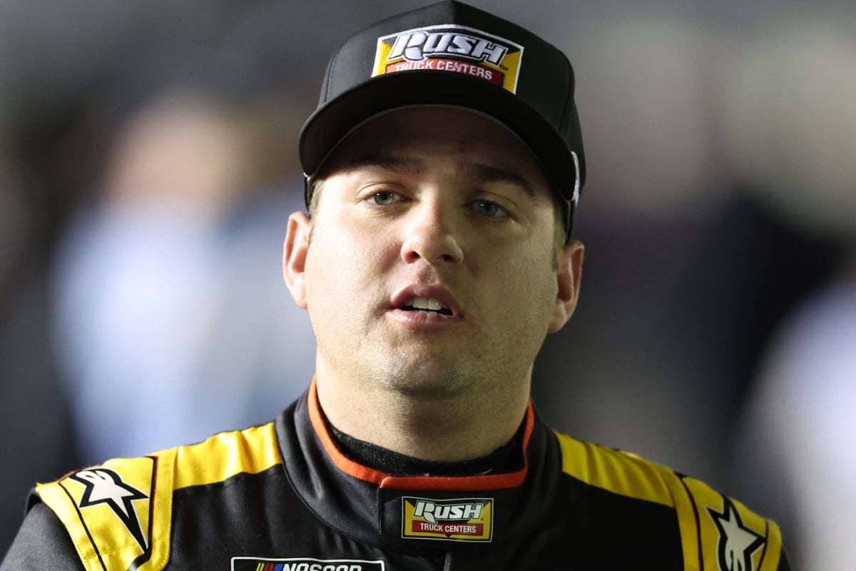 An image of NASCAR driver Noah Gragson looking emotional