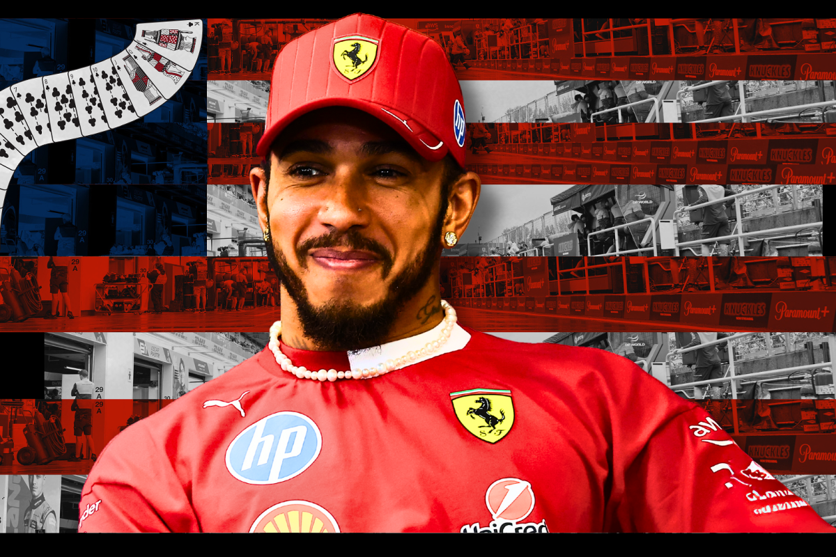 Happy Hamilton in Ferrari F1 kit in front of USA-themed Vegas flag
