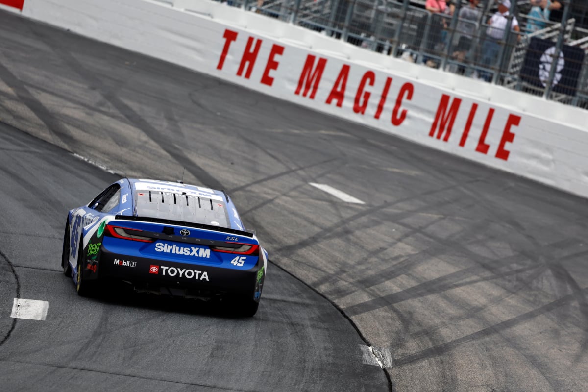 An image of NASCAR Cup Series driver Tyler Reddick driving at New Hampshire Motor Speedway
