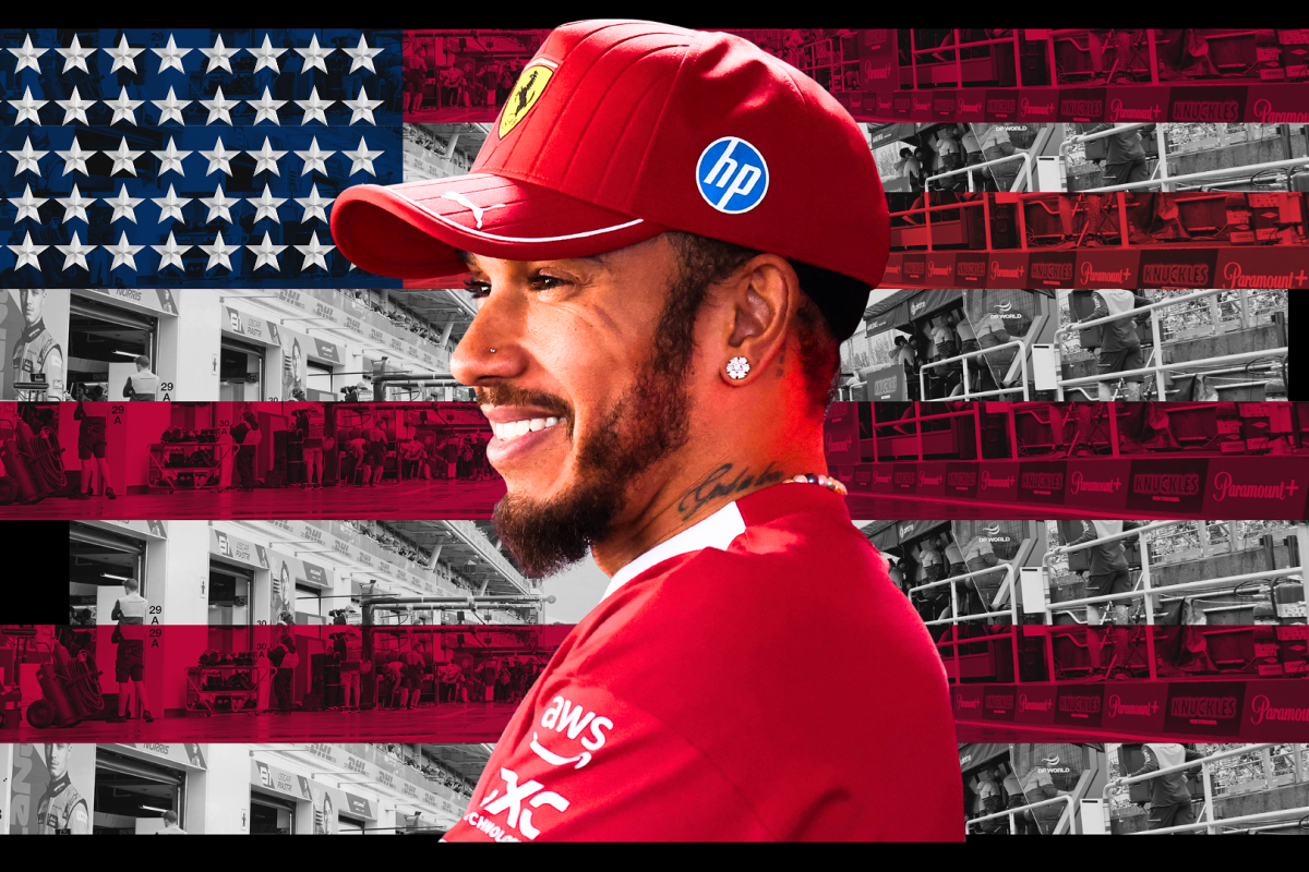 Lewis Hamilton smiling and looking happy on an edit of the US flag in the background