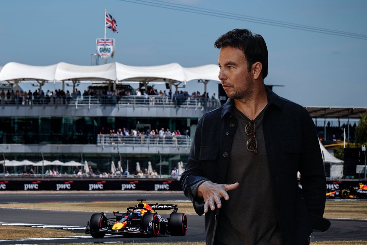 Sergio Perez in front of the Silverstone track as two Red Bulls drive behind him
