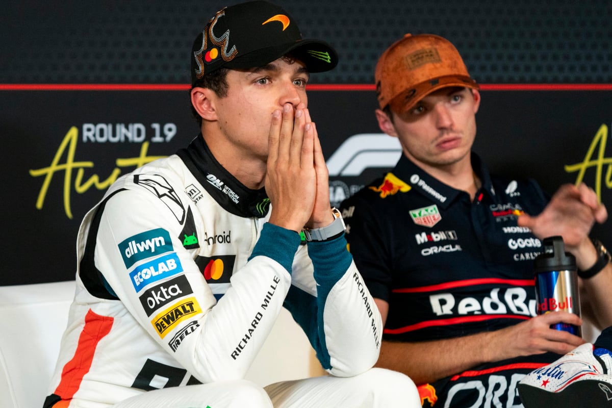 Lando Norris with Max Verstappen in the background