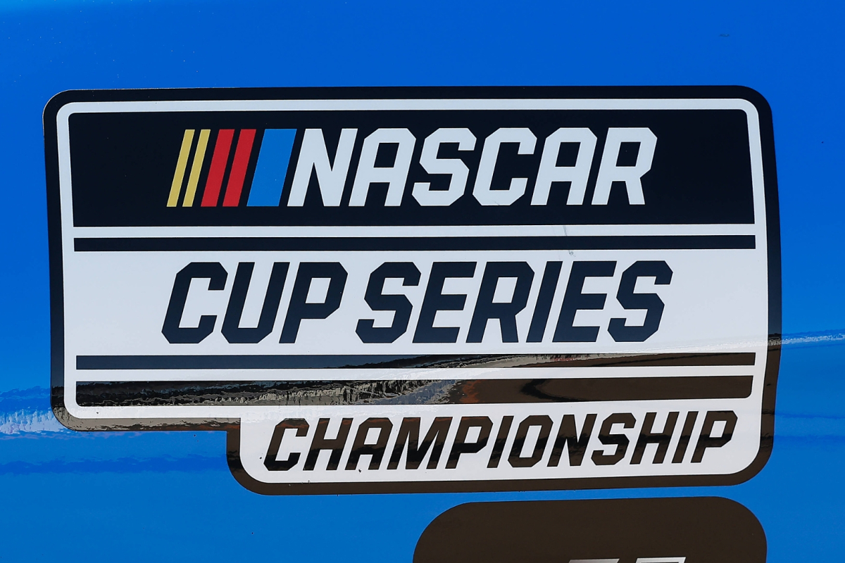 An image of the NASCAR Cup Series championship logo on a blue car