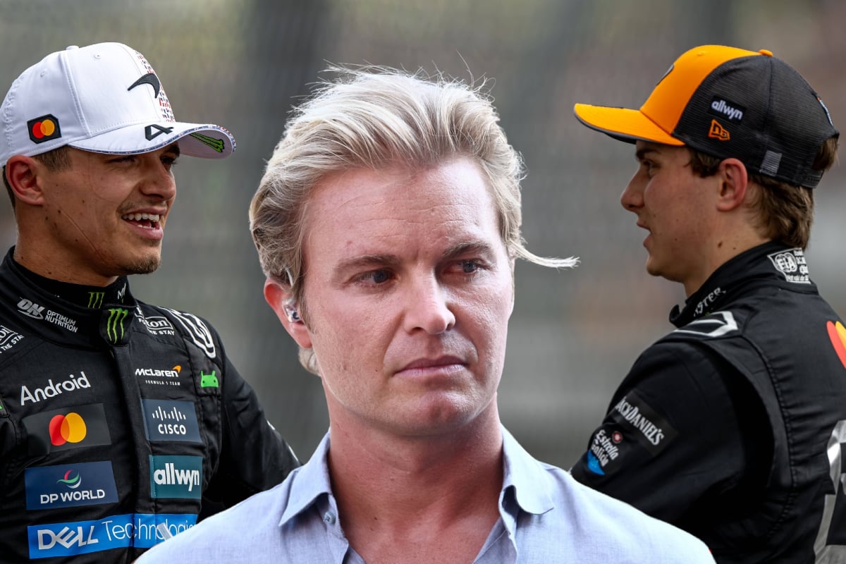 Lando Norris and Oscar Piastri look at one another with a scowling Nico Rosberg between them