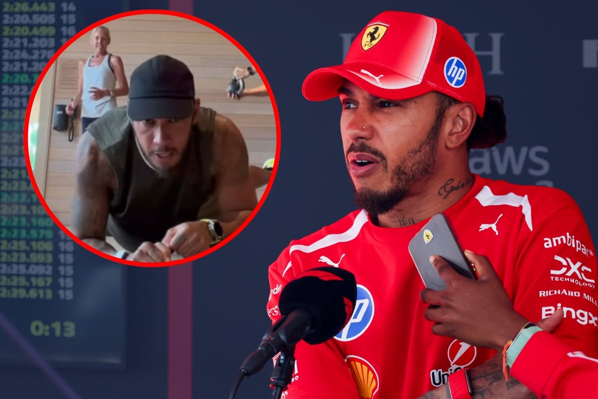 Lewis Hamilton is seen looking at an inset of him training