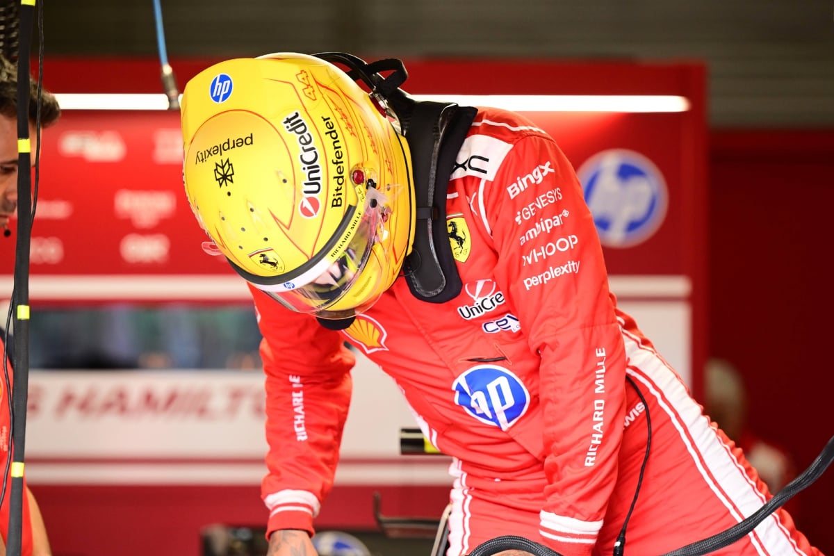 Lewis Hamilton climbs out of the SF-26 in the Ferrari garage at the Belgian GP