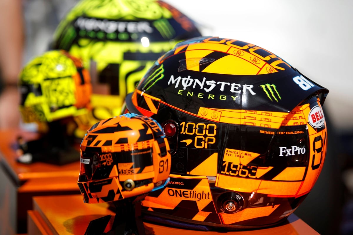 Norris and Piastri F1 helmets next to LEGO versions in Monaco harbour