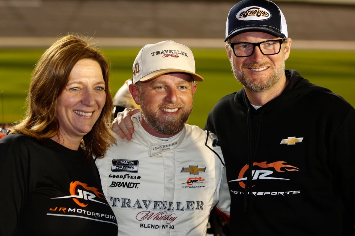 An image of JR Motorsports co-owners Kelly Earnhardt Miller and Dale Earnhardt Jr. with driver Justin Allgaier